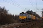 Die Class 66 von BRLL fhrt mit einem gemischten Containerzug von Aachen-West nach Belgien.