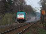 Schwer an ihrer Last ziehend und mit viel Sand vor den Rdern kommt Cobra 186 222 (2830) am 30.03.2011 die Rampe der Montzenroute von Aachen West zum Gemmenicher Tunnel hoch.