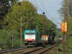 Mit Leichtigkeit kommt Cobra 186 235 (2843) am 15.04.2011 mit einem nur teilweise beladenen Containerzug die Rampe der Montzenroute von Aachen West nach Montzen hoch.