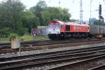 Die Class 66 DE6311  Hanna  von Crossrail fhrt mit einem gemischten Containerzug von Aachen-West nach Belgien bei Wolken.