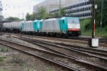 Zwei Cobra 2833 und 2830 kommen mit einem lzug aus Antwerpen-Petrol nach Basel(CH) und  fahren in Aachen-West ein bei Wolken.