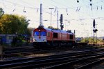 Die Class 66 DE6311 von Crossrail fhrt mit einem Containerzug von Aachen-West nach Antwerpen-Combinant(B) bei Sonne.