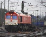 Die Class 66 DE6310  Griet  von Crossrail fhrt mit einem Bulkhaul-Ganzzug von Aachen-West nach Zeebrugge-Ramskapelle(B) bei Wolken am 21.1.2012.