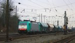 Die Cobra 2832 fhrt mit einem Kalkleerzug aus Oberhausen nach Hermalle-Huy(B) bei der Abfahrt aus Aachen-West bei Wolken am 24.2.2012.