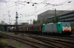 Die Cobra 2824 kommt mit einem gemischten Gtzug Antwerpen-Noord(B) nach Kln-Gremberg und fhrt in Aachen-West ein bei Wolken am 5.4.2012.