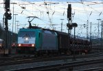 Die Cobra 2828 fhrt mit einem gemischten Gterzug aus Osnabrck nach Kortenberg-Goederen(B) bei der Ausfahrt von Aachen-West bei Abendstimmung am 11.4.2012.