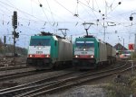 Die Cobra 2809 steht mit einem gemischten Gterzug und wartet auf die Abfahrt nach Belgien und die Cobra 2831  fhrt mit einem LKW-Ambrogio-Zug aus Gallarate(I) nach Muizen(B) bei Ausfahrt in Aachen-West und fhrt ber die Montzenroute nach Belgien.
Und im Hintergrund stehen Zwei Class 66 DE6312  Alix  von Crossrail und die DE6302 
von DLC Railways auf dem abstellgleis bei Abendstimmung am 18.4.2012.