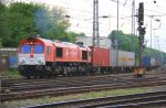 Die Class 66 DE6310  Griet  von Crossrail fhrt mit viel Gas einem Containerzug von Aachen-West nach Belgien bei Abendstimmung am 11.5.2012.