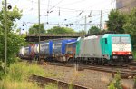 Die Cobra 2821 kommt mit einem Containerzug aus Belgien und fhrt in Aachen-West ein bei Wolken am 25.6.2012.