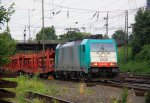 Die Cobra 2828 kommt mit einem Autoleerzug aus Belgien und fhrt in Aachen-West ein in der Abendstimmung am 18.7.2012.