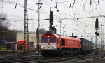 Die Class 66 DE6311  Hanna  von Crossrail fhrt mit viel Gas mit einem Bulkhaul-Ganzzug aus Melzo(I) nach Zeebrugge-Ramskapelle(B) bei der Ausfahrt aus Aachen-West und fhrt in Richtung