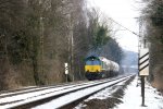 Die Class 66 PB15 von Railtraxx BVBA kommt die Gemmenicher-Rampe hochgefahren mit 5 Silowargen von Aachen-West nach Belgien.