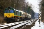 Die Class 66 PB15 von Railtraxx BVBA kommt die Gemmenicher-Rampe hochgefahren mit einem Kurzen Silozug von Aachen-West nach Belgien und fhrt in Richtung Montzen/Belgien.