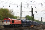 Die Class 66 DE6311  Hanna  von Crossrail fhrt mit einem sehr langen Dacia-Autozug aus Ciumesti(RO) nach Tongeren(B) bei der Ausfahrt aus Aachen-West und fhrt in Richtung Montzen/Belgien bei Wolken