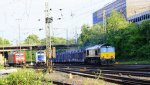 Die Class 66 PB15 von Railtraxx BVBA kommt kommt aus Richtung Montzen/Belgien mit einem langen Dacia-Autoleerzug aus Tongeren(B) nach Ciumesti(RO) und fhrt in Aachen-West ein.