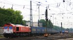 Die Class 66 DE6310  Griet  von Crossrail fhrt mit einem langen Bulkhaul-Ganzzug aus Melzo(I) nach Zeebrugge-Ramskapelle(B) bei der Ausfahrt aus Aachen-West und fhrt in Richtung Montzen/Belgien bei