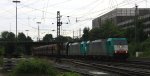 Zwei Cobra 2830 und 2810 kommen mit einem langen Kalkzug aus Yves-Gomeze(B) nach Millingen und fahren in Aachen-West ein in der Abendsonne und Wolken am Abend vom 28.6.2013.