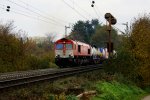 Die Class 66 DE6301  Debora  von Crossrail kommt mit viel Gas Gemmenicher-Rampe hochgefahren aus Richtung Aachen-West in Richtung Montzen/Belgien mit einem langen Containerzug aus Novara(I) nach