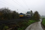 Die Class 66 PB14 von Railtraxx BVBA kommt mit einem langen Fiat-Autozug Tychy(PL) nach Antwerpen(B) von Aachen-West und fhrt die Gemmenicher-Rampe hoch nach Belgien.