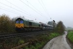 Die Class 66 PB14 von Railtraxx BVBA kommt mit einem langen Fiat-Autozug Tychy(PL) nach Antwerpen(B) von Aachen-West und fhrt die Gemmenicher-Rampe hoch nach Belgien.