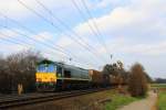 Die Class 66 PB14 von Railtraxx BVBA kommt die Gemmenicher-Rampe hochgefahren mit einem P&O Containerzug aus Gallarate(I) nach Zeebrugge(B) aus Richtung Aachen-West und fährt in Richtung