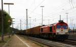 Die Class 66 DE6310  Griet  von Crossrail steht mit roten Lampen in Aachen-West mit einem sehr langen P&O Ferrymasters Containerzug und wartet auf die Abfahrt nach Zeebrugge(B).