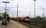 Die Class 66 DE6310  Griet  von Crossrail fährt mit viel Dieselpower mit einem P&O Ferrymasters Containerzug aus Gallarate(I) nach Zeebrugge(B) bei der Ausfahrt von Aachen-West und fährt in