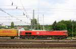 Die Class 66 PB03  Mireille  von Crossrail fährt mit einem langen Containerzug aus Gallarate(I) nach Zeebrugge(B) bei Ausfahrt aus Aachen-West und fährt in Richtung Montzen/Belgien.