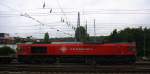 Die Class 66 DE6311  Hanna  von Crossrail fährt  mit viel Dieselpower mit einem sehr langen MSC-Containerzug aus Weil Am Rhein(D) nach Antwerpen-Berendrecht(B) bei der Ausfahrt aus Aachen-West