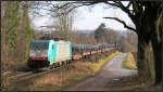 Mit einen Coilzug am Haken befährt die belgische Cobra 2827 die Montzenroute bergauf zum Gemmenicher Tunnel.Szenario bildlich festgehalten am Gemmenicher Weg unweit von Aachen am 26.02.15.