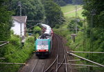 Die Cobra 2834  kommt die Gemmenicher-Rampe hochgefahren aus Aachen-West mit einem Suzuki-Autozug aus Gelsenkirchen-Bismarck(D) nach Zeebrugge-Pelikaan(B) und fährt gleich in den