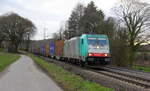 186 123 von Railtraxx  kommt die Gemmenicher-Rampe herunter nach Aachen-West mit einem Containerzug aus Zeebrugge-Ramskapelle(B) nach Milano-Segrate(I).
Aufgenommen an der Montzenroute am Gemmenicher-Weg. 
Bei Sonne und Regenwolken am Nachmittag vom 7.2.2019.