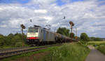 186 259-8 von DB-Schenker kommt aus Richtung Aachen-West und fährt die Gemmenicher-Rampe hoch mit einem langen Ölleerzug aus Basel(CH) nach Antwerpen-Petrol(B) und fährt in Richtung Gemmenicher-Tunnel,Botzelaer(B),Gemmenich(B),Nouvelaer(B),Moresnet(B),Moresnet-Chapelle(B),Montzen(B). 
Aufgenommen an der Gemmenicher-Rampe am Gemmenicher-Weg an der Montzenroute. 
Bei Sonne und Regenwolken am Nachmittag vom 8.6.2019.