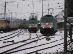 Die Cobra 2837 fhrt  in als Lokzug von Aachen-West nach Montzen/Belgien  rechts steht die Cobra 2842 wartet mit eiem Kesselzug auf Abfahrt nach Kln.
4.12.2010