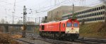 Die Class 66  DE6311  Hanna  von Crossrail rangiert in Aachen-West im Regen am 16.12.2012.