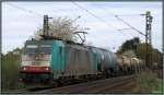 Die 2838 (E-186) kommt mit einen gemischten Kesselwagenzug die Rampe herauf nach Belgien.Hier zusehen am Gemmenicher Weg bei Aachen am Sonntag den 06.April 2014.