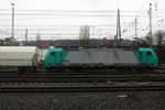 Die Cobra 2828 fährt mit einem Kalkleerzug aus Millingen(D) nach Yves-Gomezee(B)  bei der Abfahrt aus Aachen-West und fährt in Richtung Montzen/Belgien.