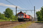 Mit einem LKW-Zug am Haken rollt die 266 284 alias DE6314 von Crossrail durch Bassenge Richtung Tongeren. Aufnahme vom 07/06/2019.