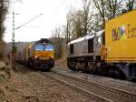 Begegnung von zwei Class66 der DLC mit Containerzgen auf der Montzenroute am Gemmenicherweg in Aachen.