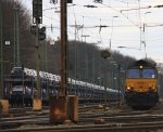 Die Class 66 DE6302 von DLC Railways steht in Aachen-West mit einem  P&O Ferrymasters Containerzug und wartet auf die Abfahrt nach Muizen(B) am 11.3.2012.