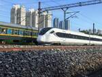 2024.10.13, CRH6A 4504, on GuangZhou---ShenZhen Railway next to ShenZhen Railway Museum. 4504 was (by my memory) passing a Loco-Hauled passenger train heading down. Between here and ShenZhen (LuoHu) Station, theres another big freight yard and depot, hence loco-hauled terminated at ShenZhen East further north might still run south via mainline to access depot for cleaning of carriages.
///
2024.10.13, CRH6A 4504, auf der GuangZhou---ShenZhen Eisenbahn neben dem ShenZhen Eisenbahnmuseum. 4504 überholte (nach meiner Erinnerung) einen lokbespannten Personenzug auf dem Weg nach unten. Zwischen hier und dem Bahnhof ShenZhen (LuoHu) gibt es einen weiteren großen Güterbahnhof und ein Depot, so dass ein lokbespannter Zug, der weiter nördlich in ShenZhen East endet, immer noch über die Hauptstrecke nach Süden fahren kann, um zum Depot zu gelangen und die Wagen zu reinigen.