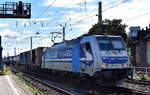 RTB Cargo - Rurtalbahn Cargo GmbH, Düren [D] mit der Railpool Lok '186 426-3' [NVR-Numer: 91 80 6186 426-3 D-Rpool] und einem Containerzug am 13.06.24 Höhe Bahnhof Magdeburg-Neustadt.