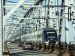 Und nochmals meine Lieblingsbrcke, die Kleinbeltsbrcke in DK. Hier habe ich mit Gott sei Dank wenig Autos daneben, einen IC 4 erwischt. Bald hat er die Insel Fnen erreicht.