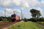 EG 3113 mit einem gemischten Güterzug am 5.8.17 aus Maschen kommend in Richtung Padborg(DK) in Eggebeeck bei Jübek 