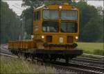 Motto: Worktrain in the Rain.  Dieser Bauzug kam mir in Rimburg vor die Linse.
Location:bach Palenberg/Juni 2012.