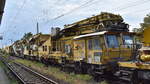 DB Bahnbau Gruppe mit der Plasser & Theurer Bettungsreinigungsmaschine RM 801-SIM ( D-DB 99 80 9 414 009-7 ) Bezeichnung BRM 162 am 30.08.23 Vorbeifahrt Bahnhof Magdeburg-Neustadt.