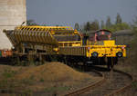 MFS 100 (Materialförder - und Silowagen) der Firma Plesser und Theurer in Brieske.