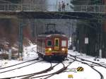 Am Ende der Sdrampe vom Buschtunnel fhrt am 17.02.2010 der Belgische Triebzug 244 AM65 mit vertikalen Scheinwerfernpaar in den Aachener Hbf.