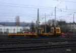 DB Netz mit einem GAF 100R + Hänger arbeitet in Aachen-West.
Aufgenommen vom Bahnsteig in Aachen-West. 
Bei Sonne und Schneeschauerwolken am Kalten Morgen vom 7.3.2016.  
























