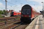 Hier links ein RE3 (RE18351) von Schwedt(Oder) nach Wünsdorf-Waldstadt (Zuglok war 114 003-7) und rechts ein RE3 (RE18312) von Elsterwerda nach Stralsund Hbf.